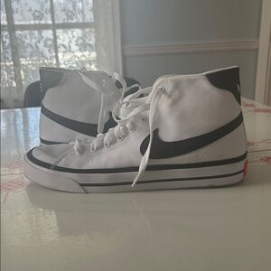 Nike White High-Top Sneakers with Black Swoosh and Trim